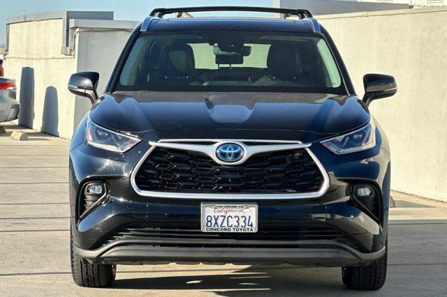 used 2021 Toyota Highlander Hybrid car, priced at $35,988