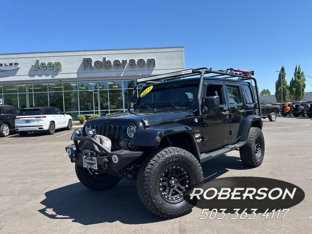 used 2013 Jeep Wrangler Unlimited car, priced at $19,998