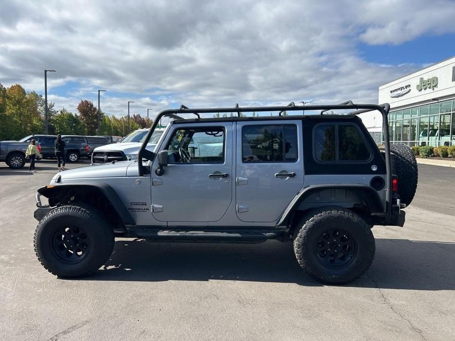 used 2015 Jeep Wrangler Unlimited car, priced at $24,998