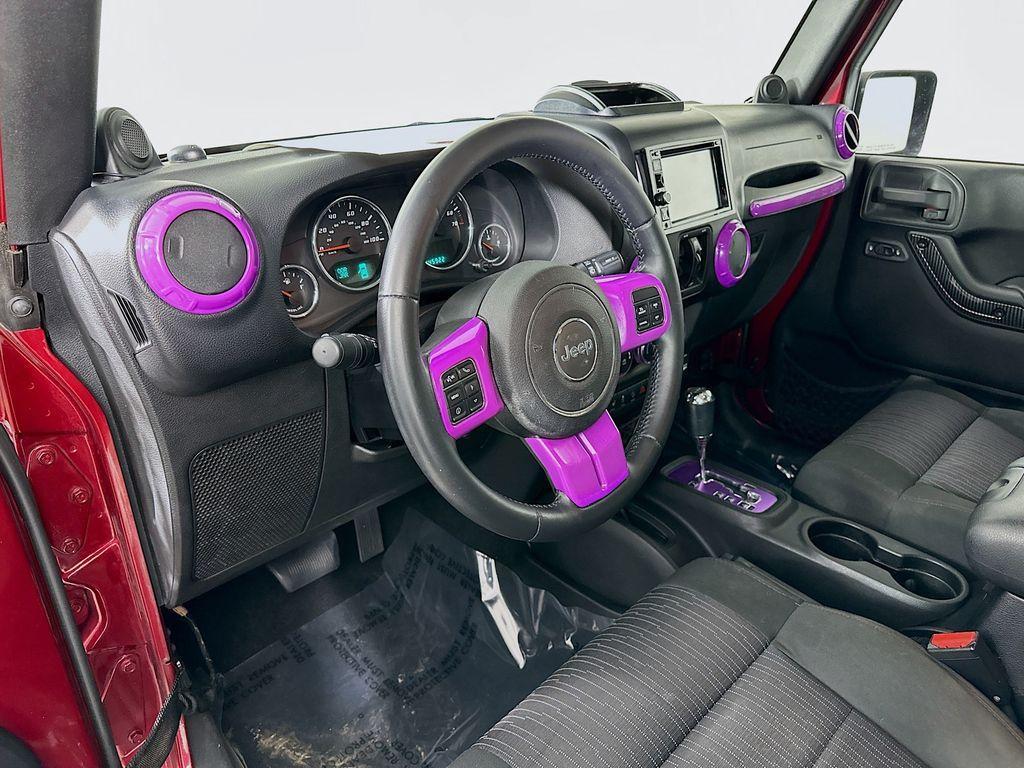 used 2012 Jeep Wrangler Unlimited car, priced at $13,599