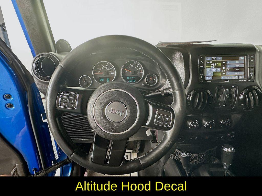 used 2014 Jeep Wrangler Unlimited car, priced at $13,993
