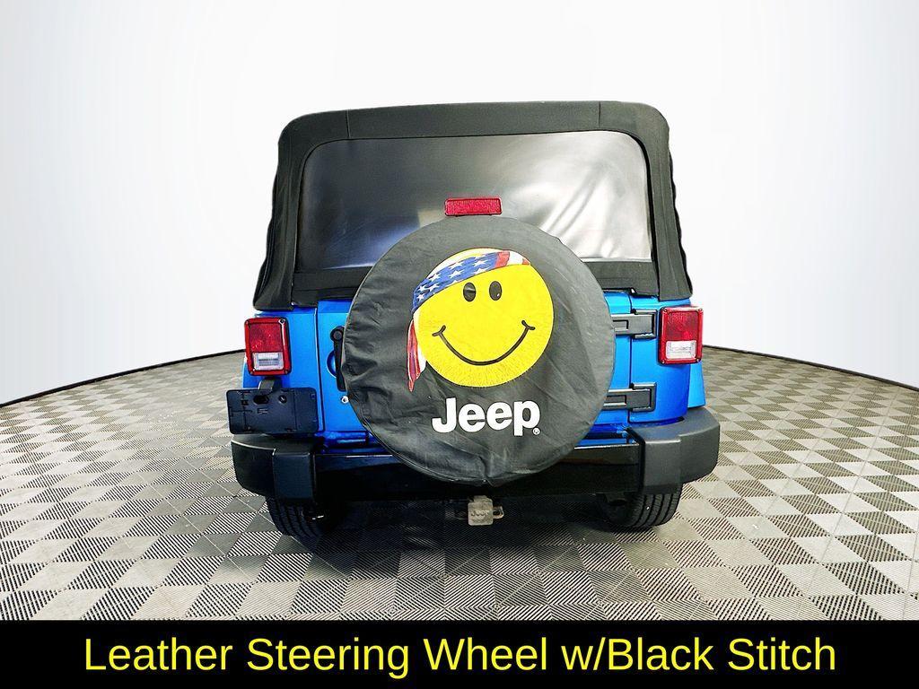 used 2014 Jeep Wrangler Unlimited car, priced at $13,993