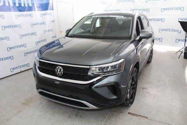 used 2023 Volkswagen Taos car, priced at $22,404