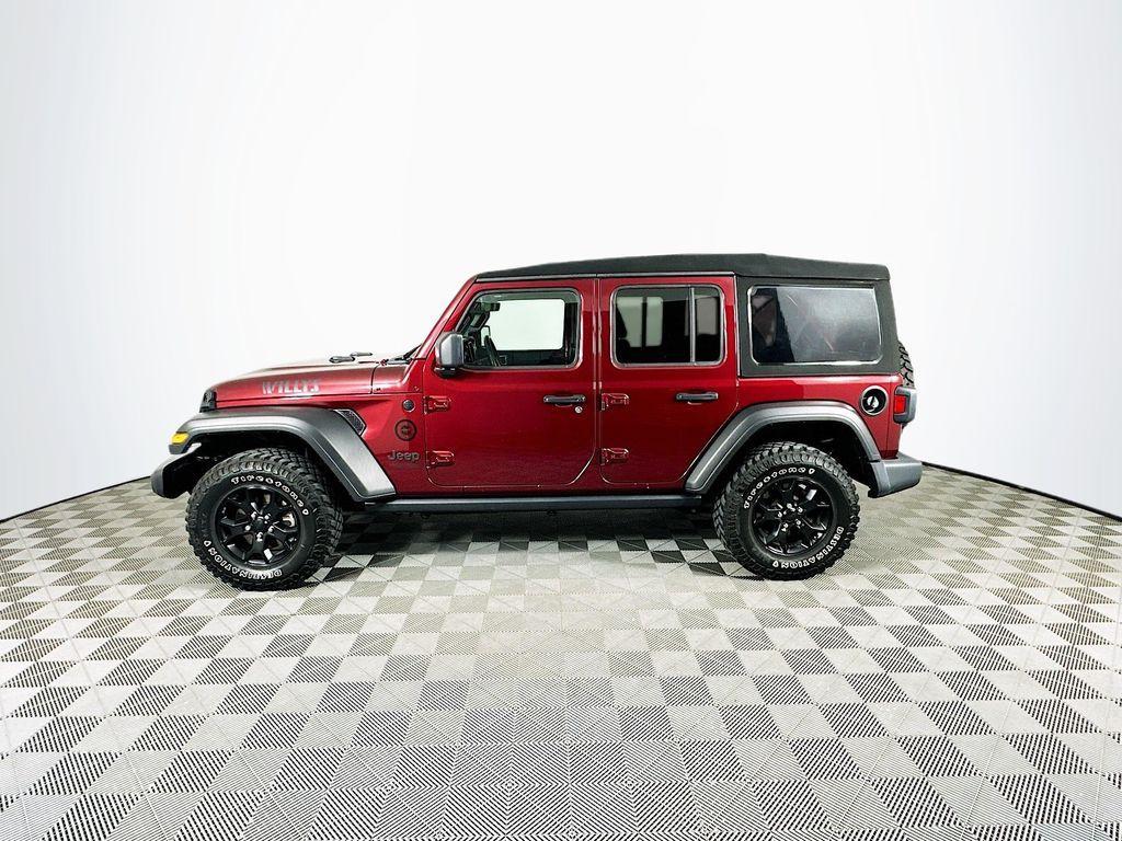 used 2021 Jeep Wrangler Unlimited car, priced at $32,401