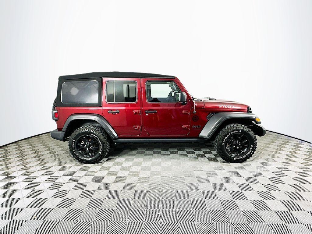 used 2021 Jeep Wrangler Unlimited car, priced at $32,401