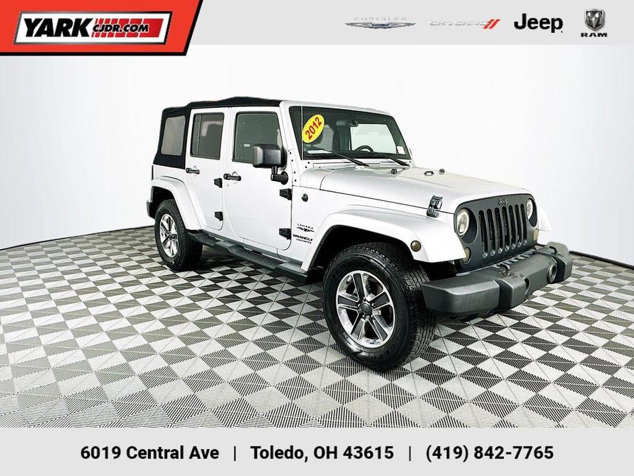 used 2012 Jeep Wrangler Unlimited car, priced at $16,599