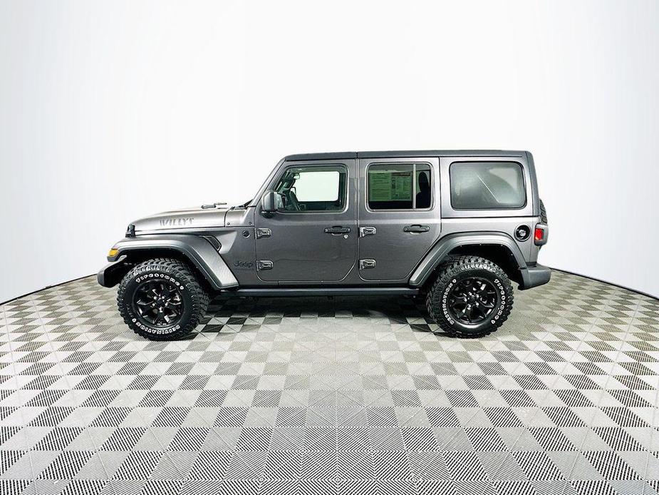 used 2021 Jeep Wrangler Unlimited car, priced at $30,900