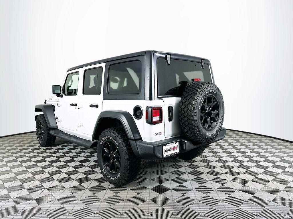 used 2021 Jeep Wrangler Unlimited car, priced at $31,844