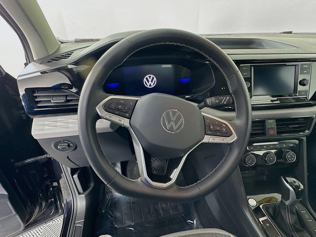 used 2024 Volkswagen Taos car, priced at $18,855
