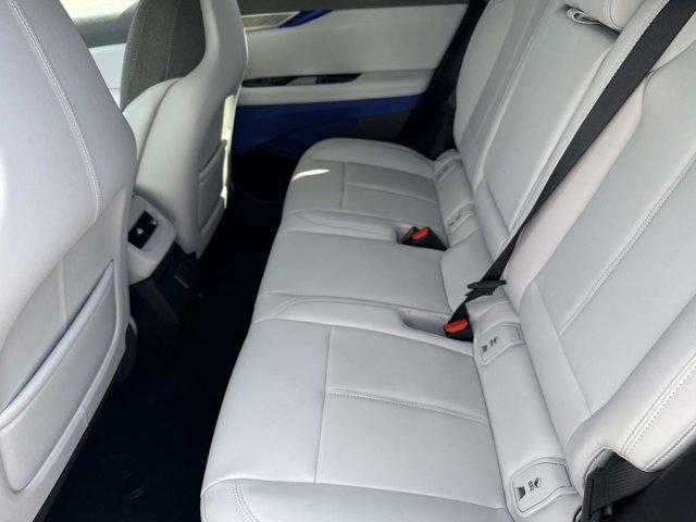 new 2026 Cadillac OPTIQ car, priced at $54,615