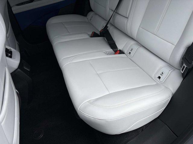 new 2025 Cadillac OPTIQ car, priced at $55,539