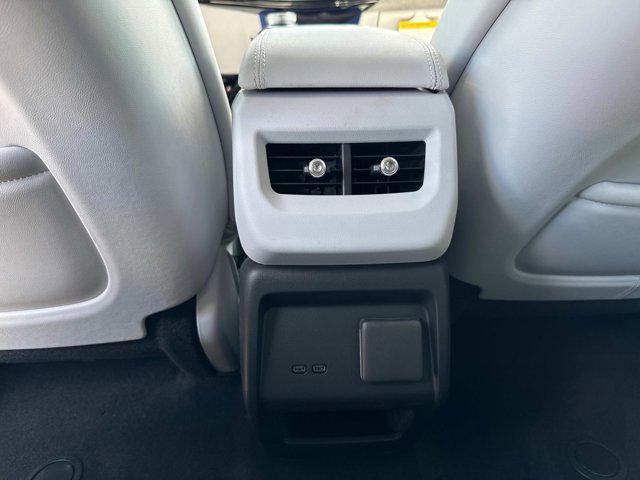 new 2025 Cadillac OPTIQ car, priced at $56,215