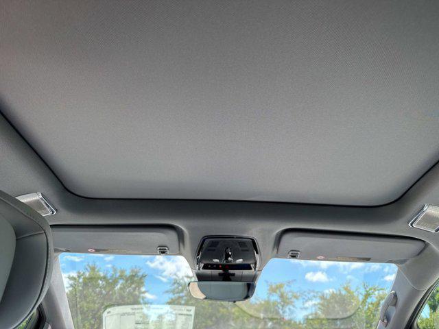 new 2025 Cadillac OPTIQ car, priced at $56,215