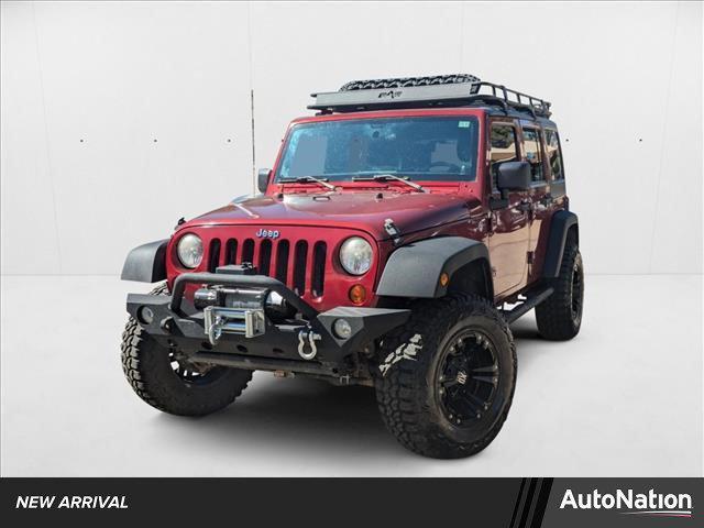 used 2012 Jeep Wrangler Unlimited car, priced at $17,999