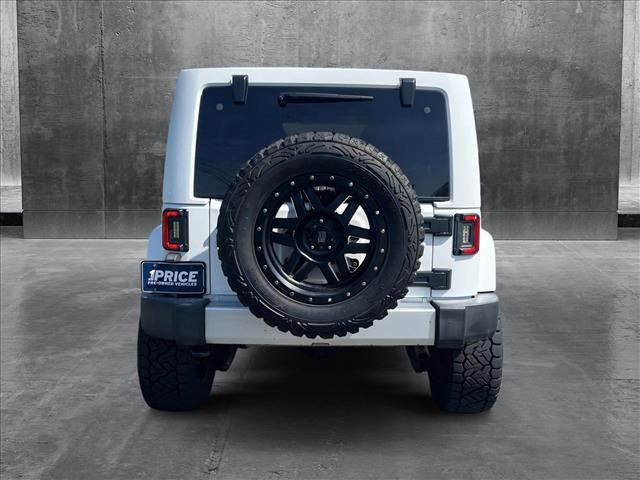 used 2015 Jeep Wrangler Unlimited car, priced at $20,456