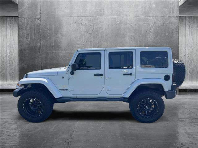 used 2015 Jeep Wrangler Unlimited car, priced at $20,456