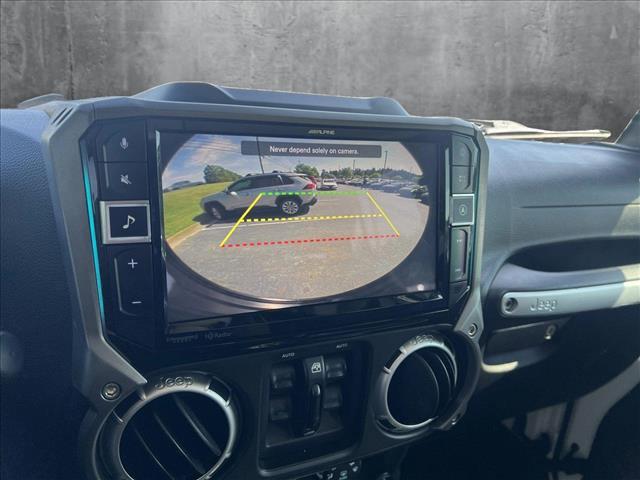 used 2015 Jeep Wrangler Unlimited car, priced at $20,456