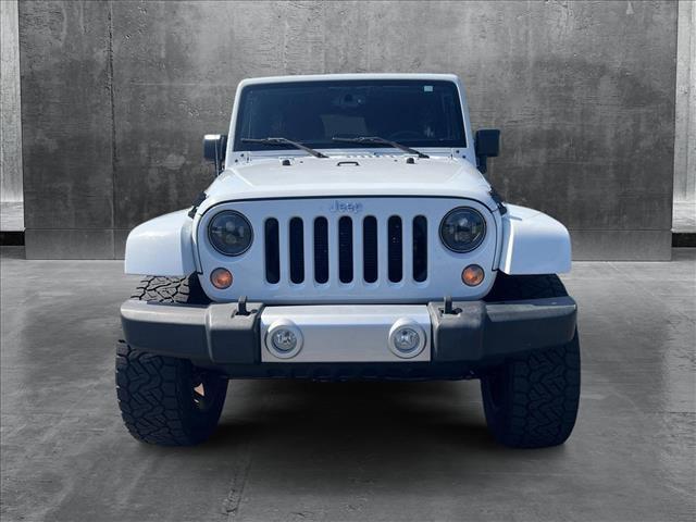 used 2015 Jeep Wrangler Unlimited car, priced at $20,456
