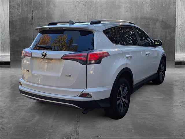 used 2018 Toyota RAV4 car, priced at $20,097