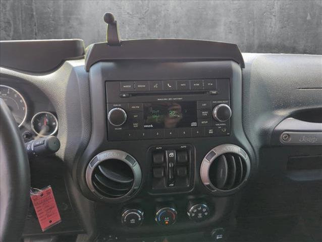 used 2017 Jeep Wrangler Unlimited car, priced at $17,573