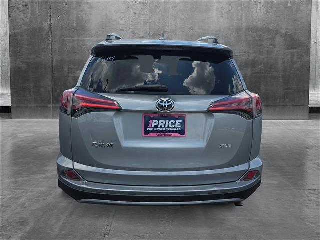 used 2018 Toyota RAV4 car, priced at $18,018
