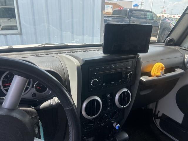used 2010 Jeep Wrangler Unlimited car, priced at $13,325