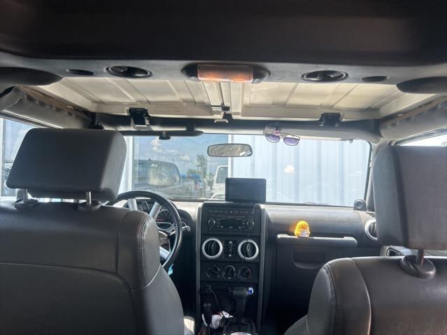used 2010 Jeep Wrangler Unlimited car, priced at $13,325