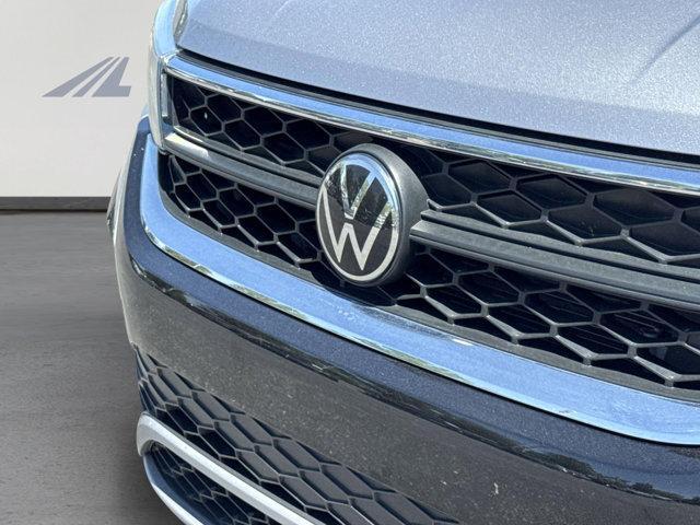 used 2023 Volkswagen Taos car, priced at $23,369