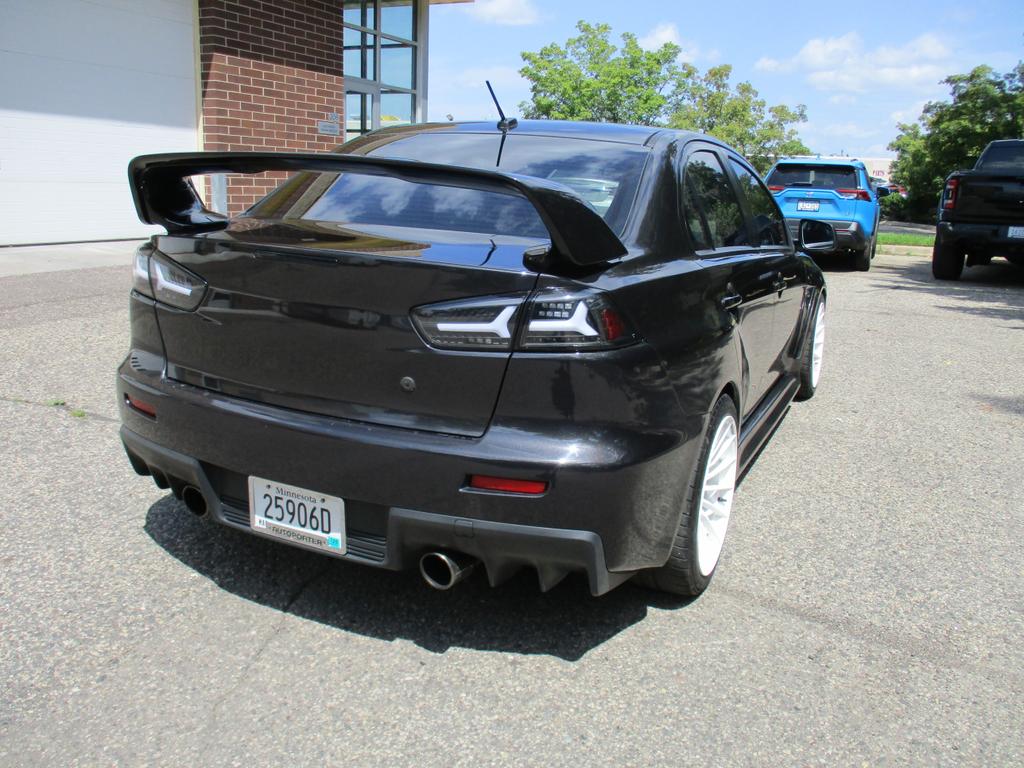 used 2013 Mitsubishi Lancer Evolution car, priced at $36,900