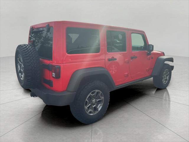 used 2013 Jeep Wrangler Unlimited car, priced at $19,894