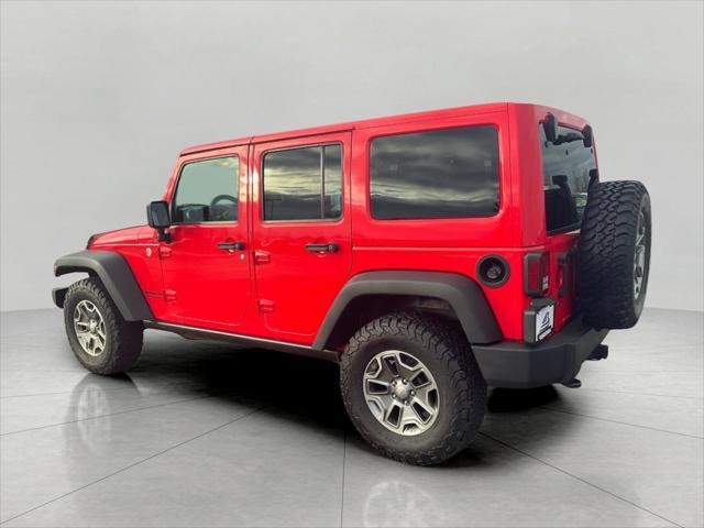 used 2013 Jeep Wrangler Unlimited car, priced at $19,894