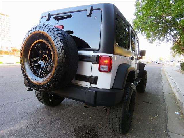 used 2015 Jeep Wrangler Unlimited car, priced at $17,699