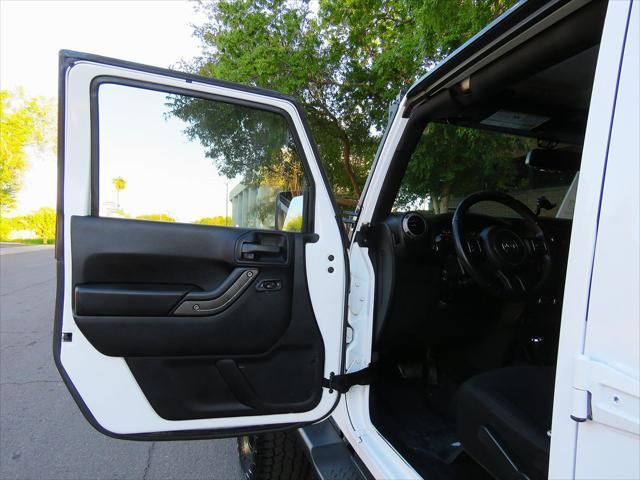 used 2015 Jeep Wrangler Unlimited car, priced at $17,699