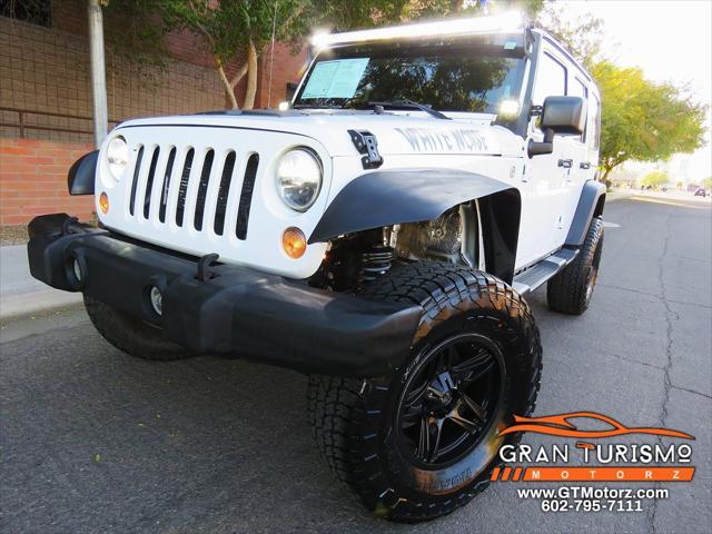 used 2015 Jeep Wrangler Unlimited car, priced at $17,699