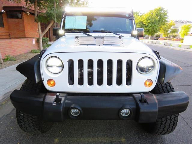 used 2015 Jeep Wrangler Unlimited car, priced at $17,699