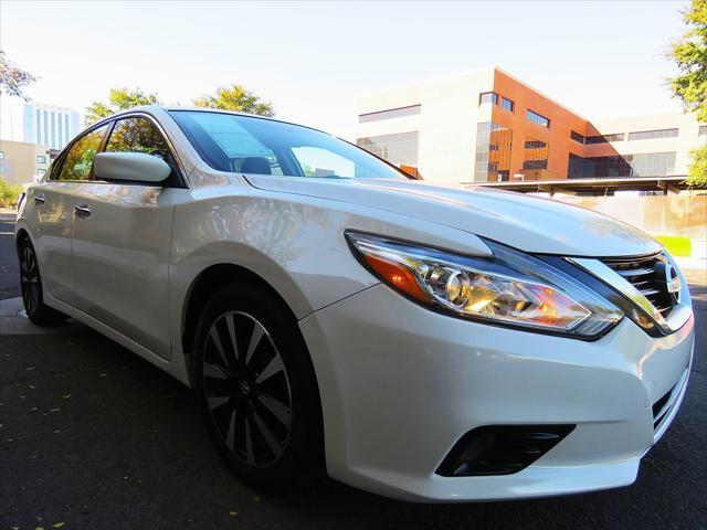 used 2018 Nissan Altima car, priced at $11,799