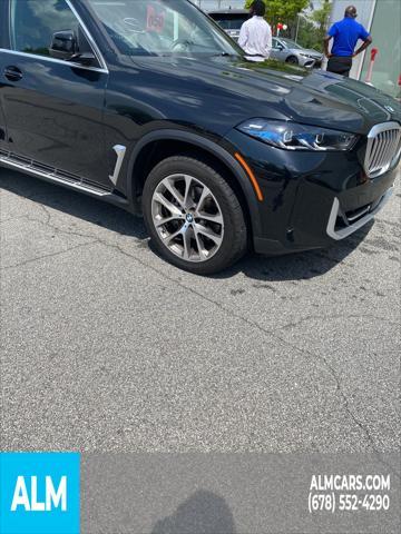 used 2024 BMW X5 car, priced at $49,820