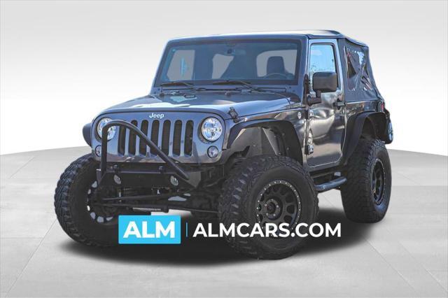 used 2014 Jeep Wrangler car, priced at $16,378