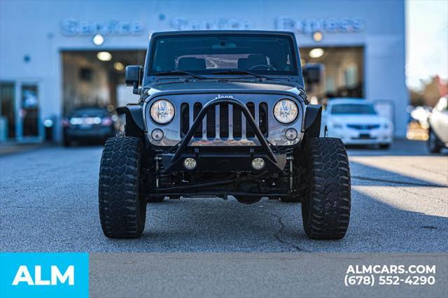 used 2014 Jeep Wrangler car, priced at $16,378