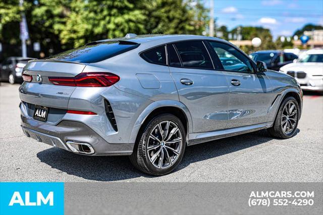 used 2024 BMW X6 car, priced at $62,420