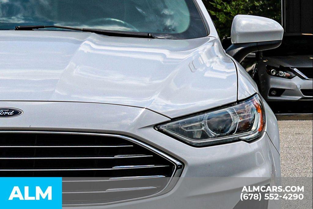 used 2019 Ford Fusion car, priced at $14,720