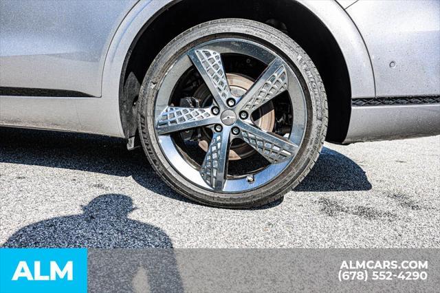used 2023 Genesis GV70 car, priced at $35,960