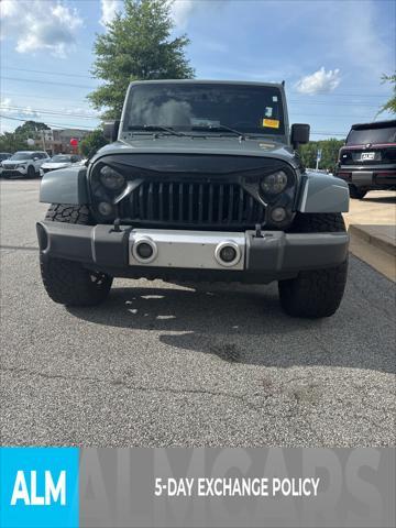 used 2015 Jeep Wrangler Unlimited car, priced at $17,120
