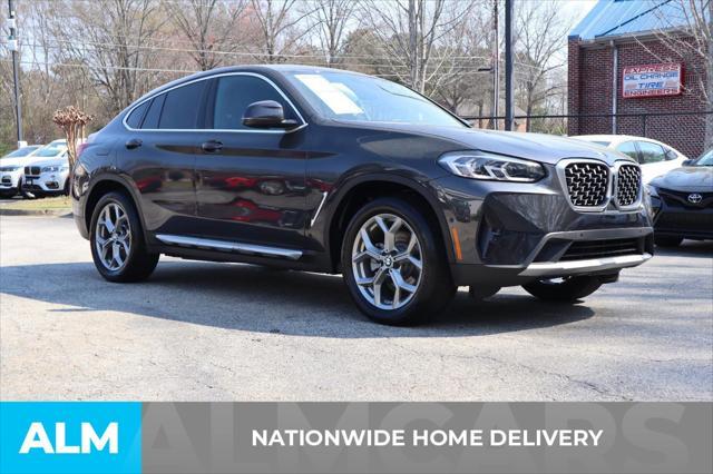 used 2023 BMW X4 car, priced at $37,320