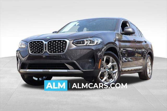 used 2023 BMW X4 car, priced at $37,320