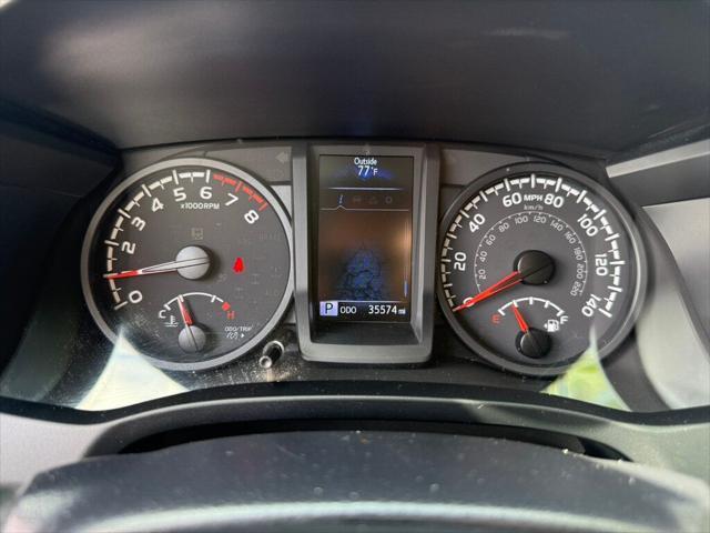 used 2023 Toyota Tacoma car, priced at $25,990