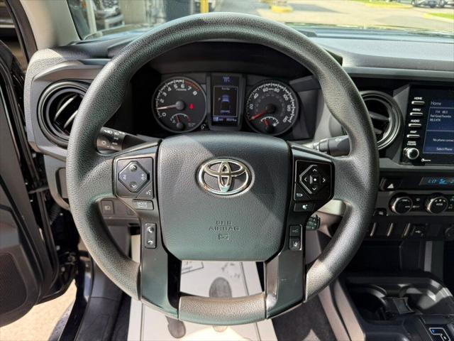 used 2023 Toyota Tacoma car, priced at $25,990