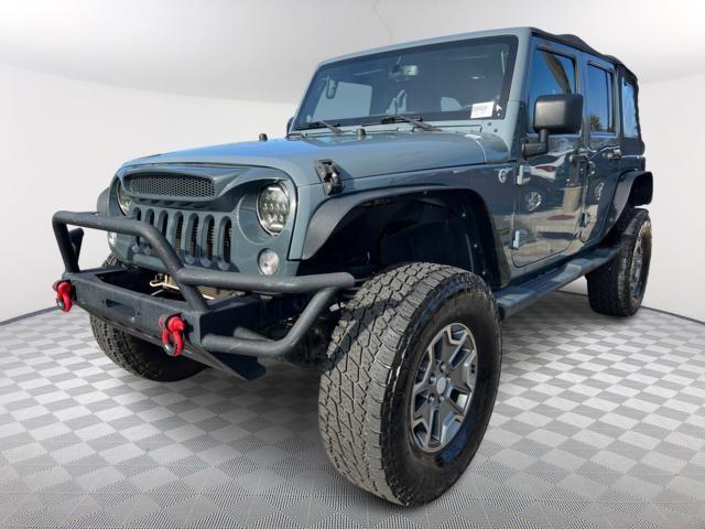 used 2014 Jeep Wrangler Unlimited car, priced at $16,586