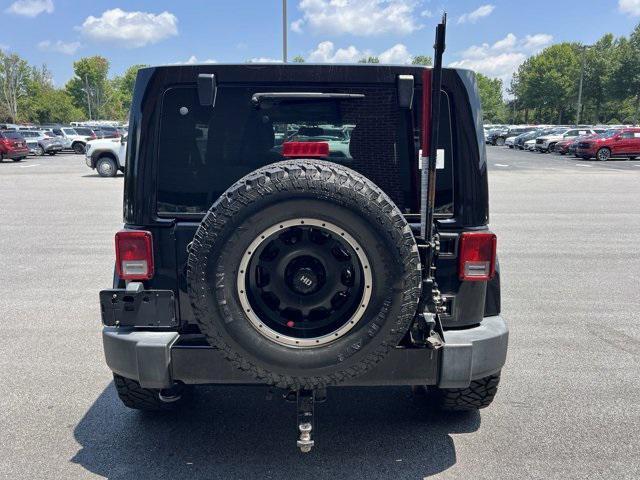 used 2016 Jeep Wrangler Unlimited car, priced at $22,281