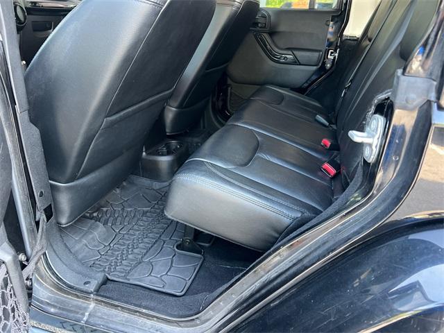 used 2014 Jeep Wrangler Unlimited car, priced at $14,333